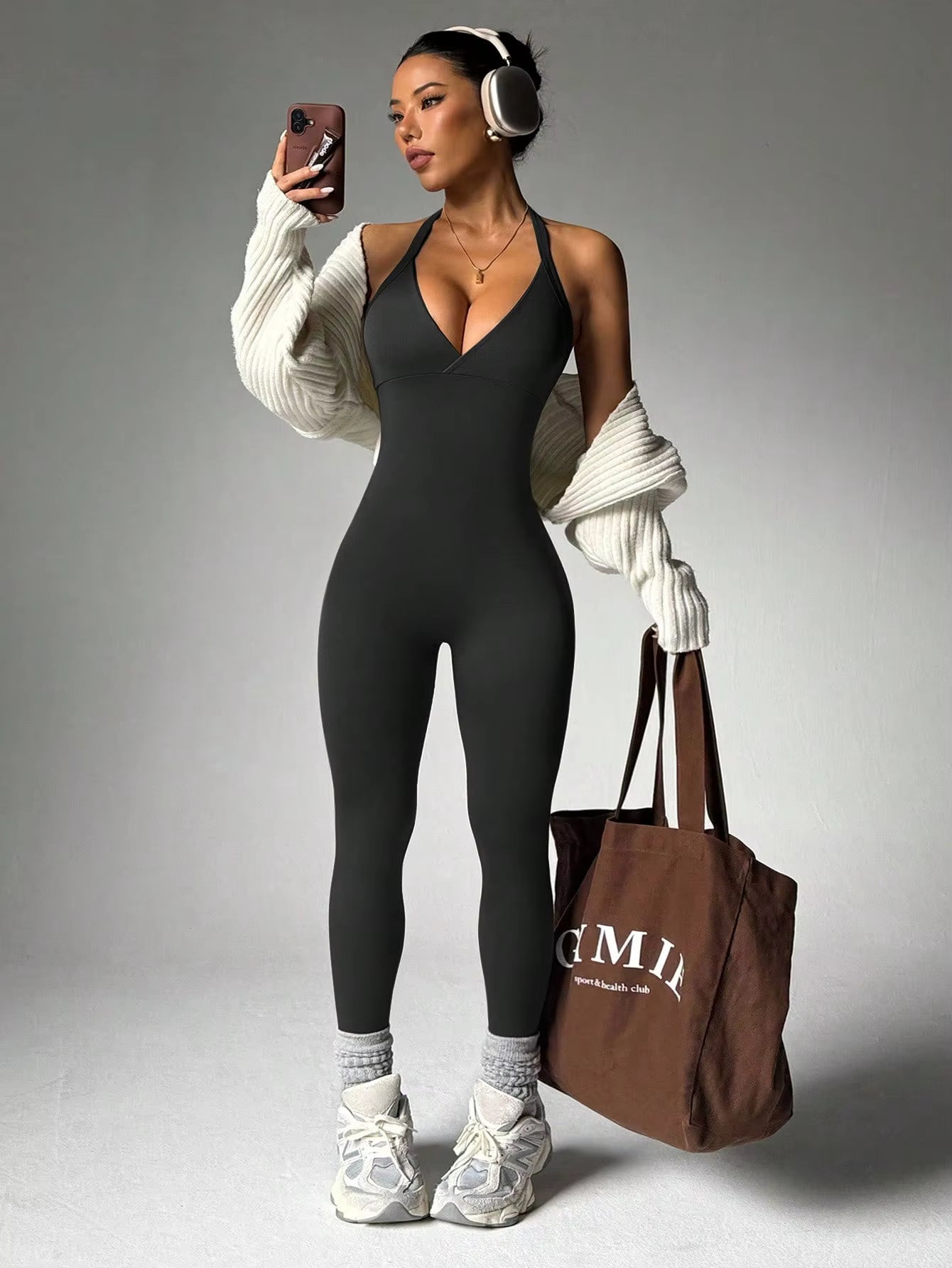 Women's solid color vest style seamless elastic sports jumpsuit with pocket design
